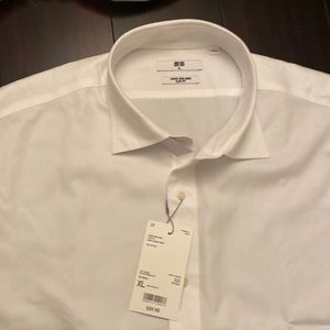 New Uniqlo white dress shirt. Long sleeve. Super non iron. 100% cotton. Size S.